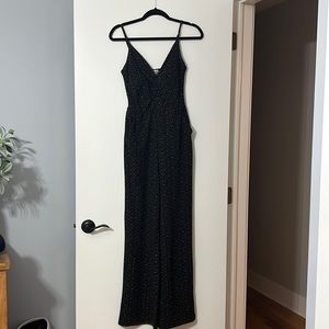 Black jumpsuit with white dotted pattern